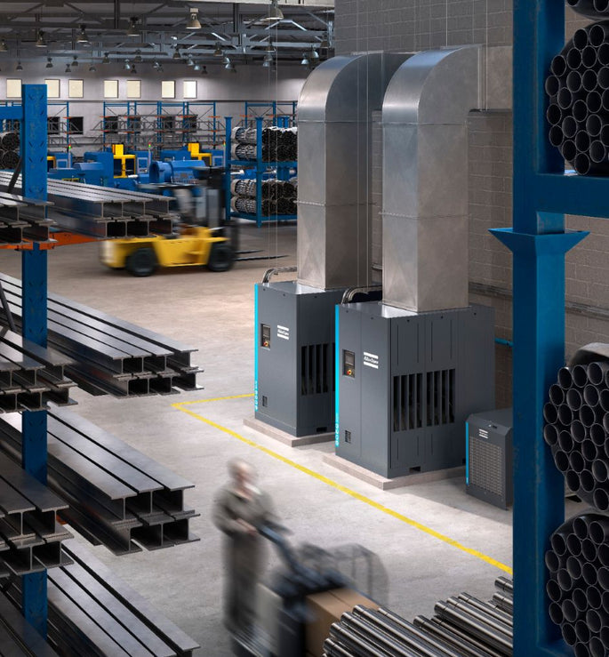 Zwei Schraubenkompressoren in der Metallindustrie.