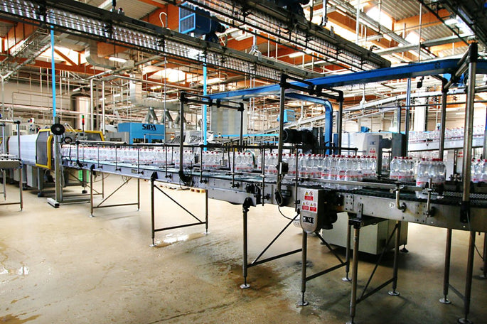 Flaschenbefüllung mit Hilfe von Druckluft und Kompressoren in der Getränkeindustrie